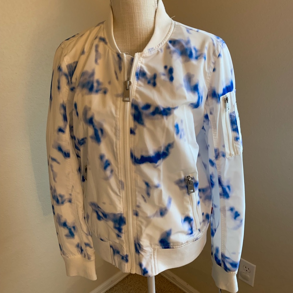 Levi’s jacket. A fashion statement. NWT White/blue, (cloud design. ( medium)